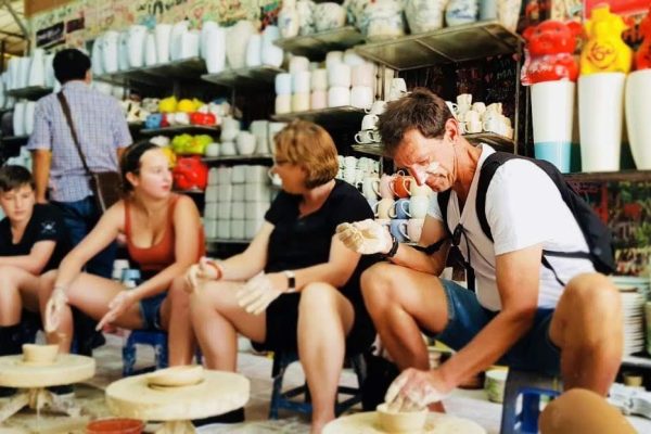 Hanoi Countryside & Bat Trang Ceramic Village Tour by Vintage Minsk Motorbike