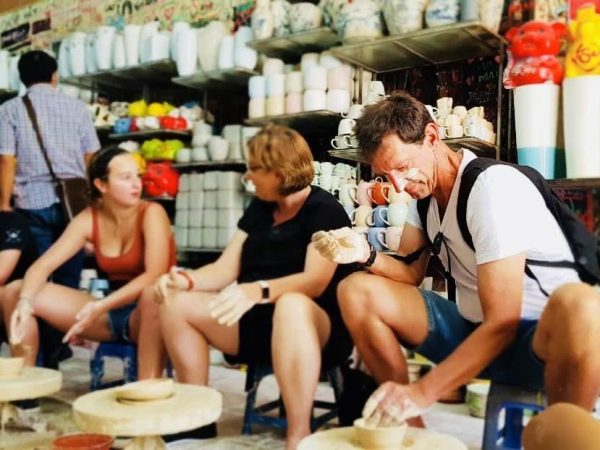 Hanoi Countryside & Bat Trang Ceramic Village Tour by Vintage Minsk Motorbike