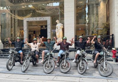 Guests starting their Hanoi Motorcycle Tour from a hotel in the city center.