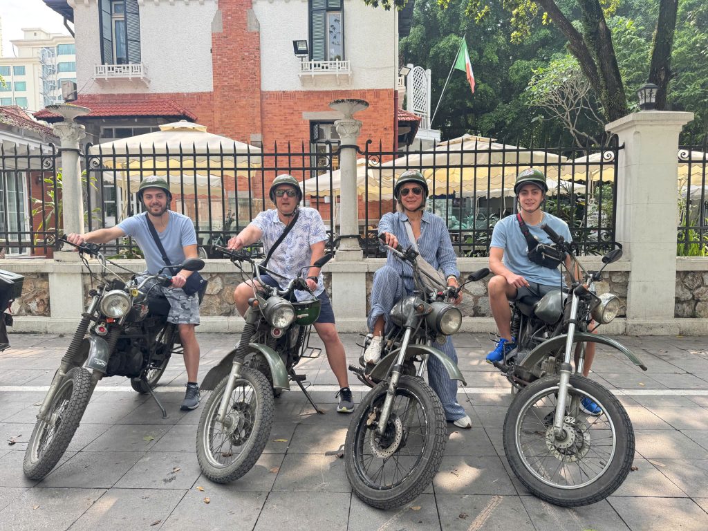 Family enjoying a private Hanoi Vintage Minsk Motorcycle Tour.
